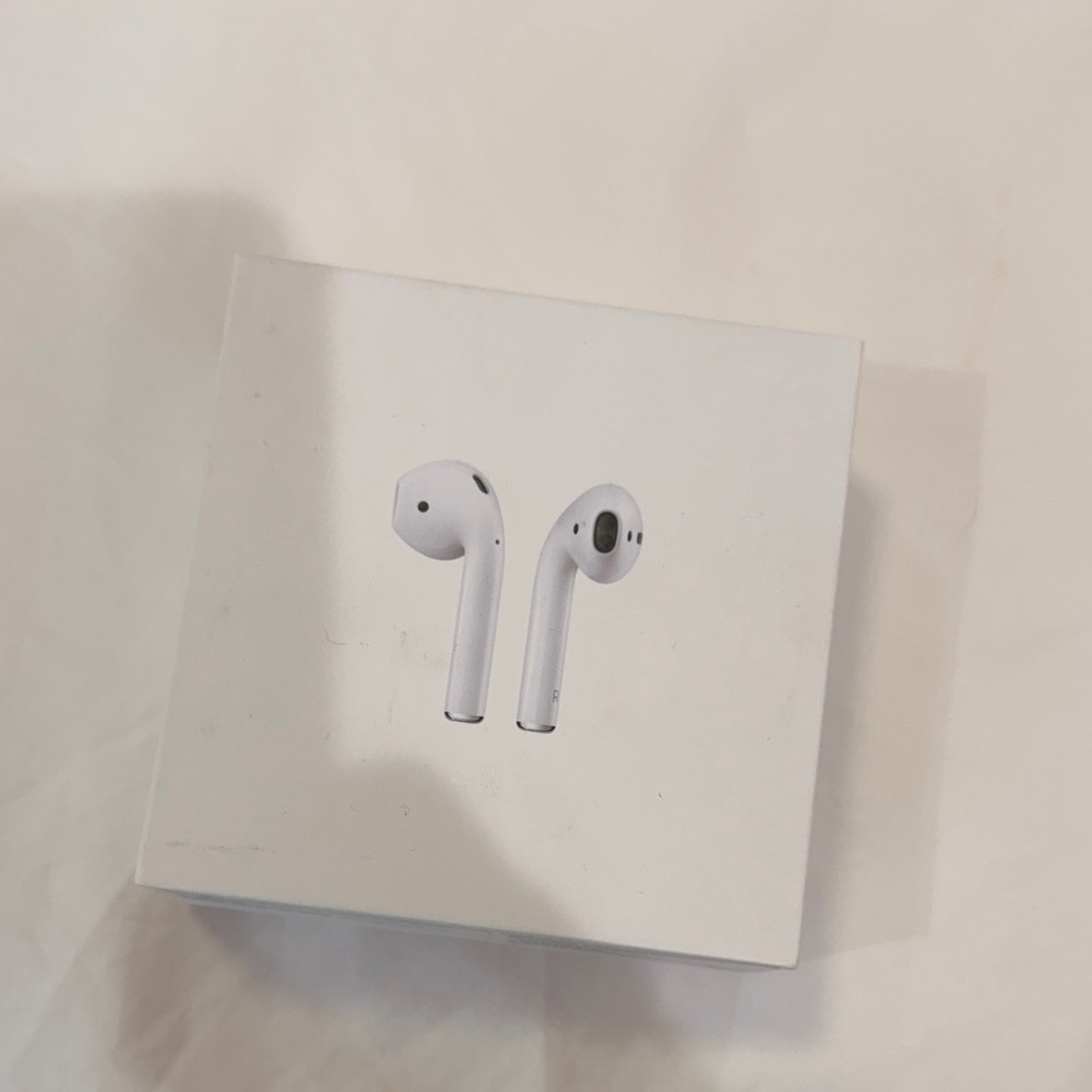 Apple AirPods with Charging Case - White